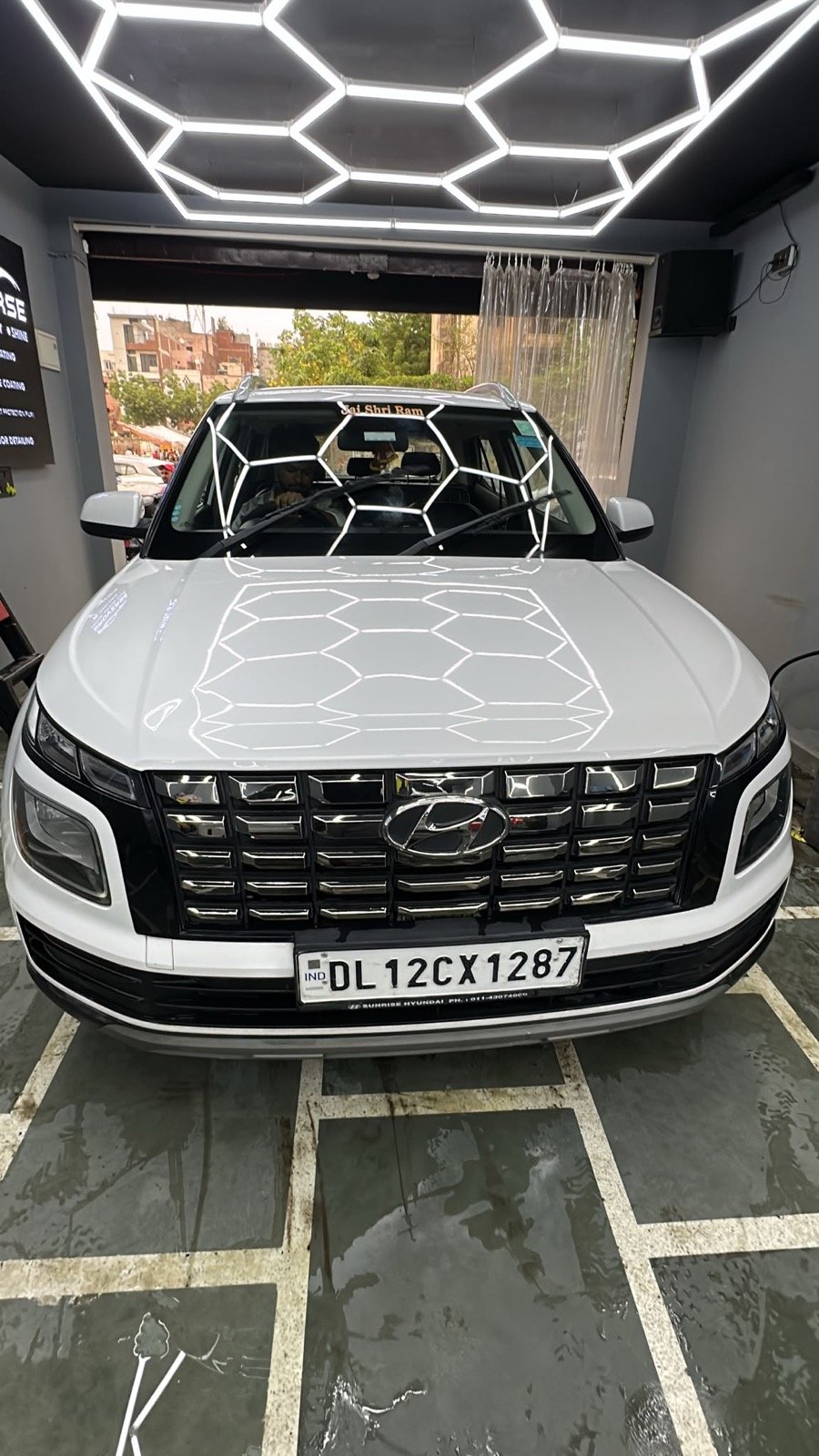 White SUV inside the Broverse studio