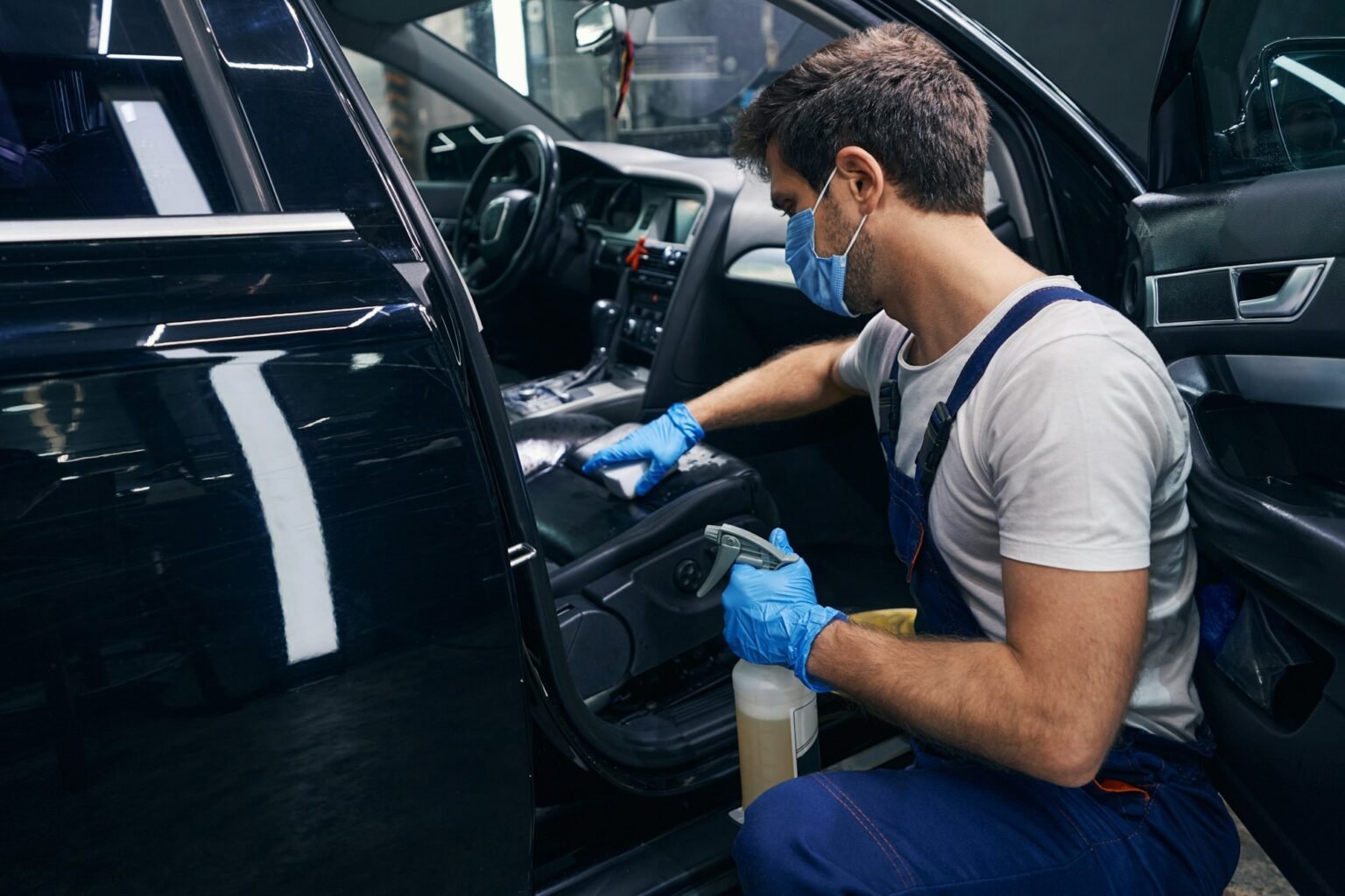 Interior detailing inside a black car